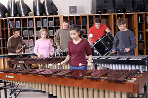 Students playing percussion instruments.